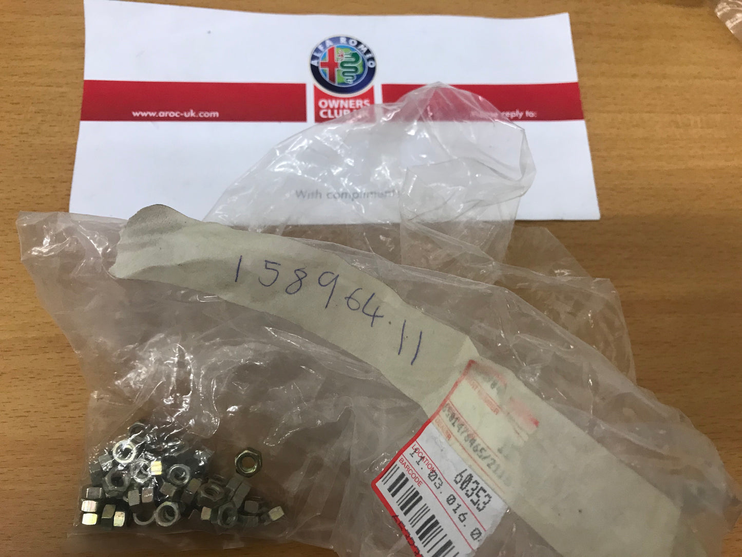 15896411 Outer light nuts (pair) for Alfa Romeo RZ/SZ, 145/6/7, 155/9, 164, 33, 75, GTV, Giulietta, Spider and Fiat